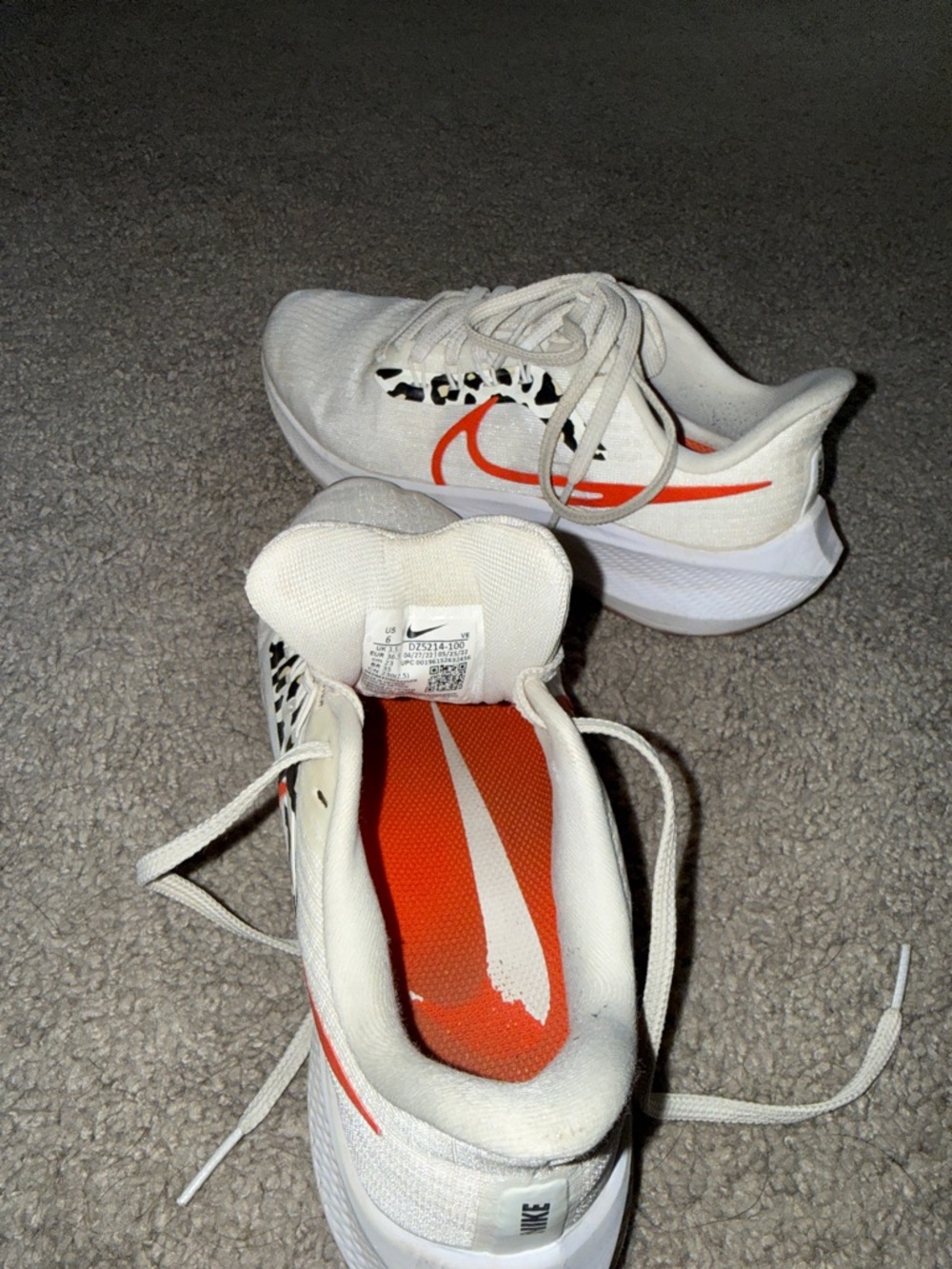 Nike White Running Shoes with Red Swoosh and Black Leopard Accent - Picture 2 of 2